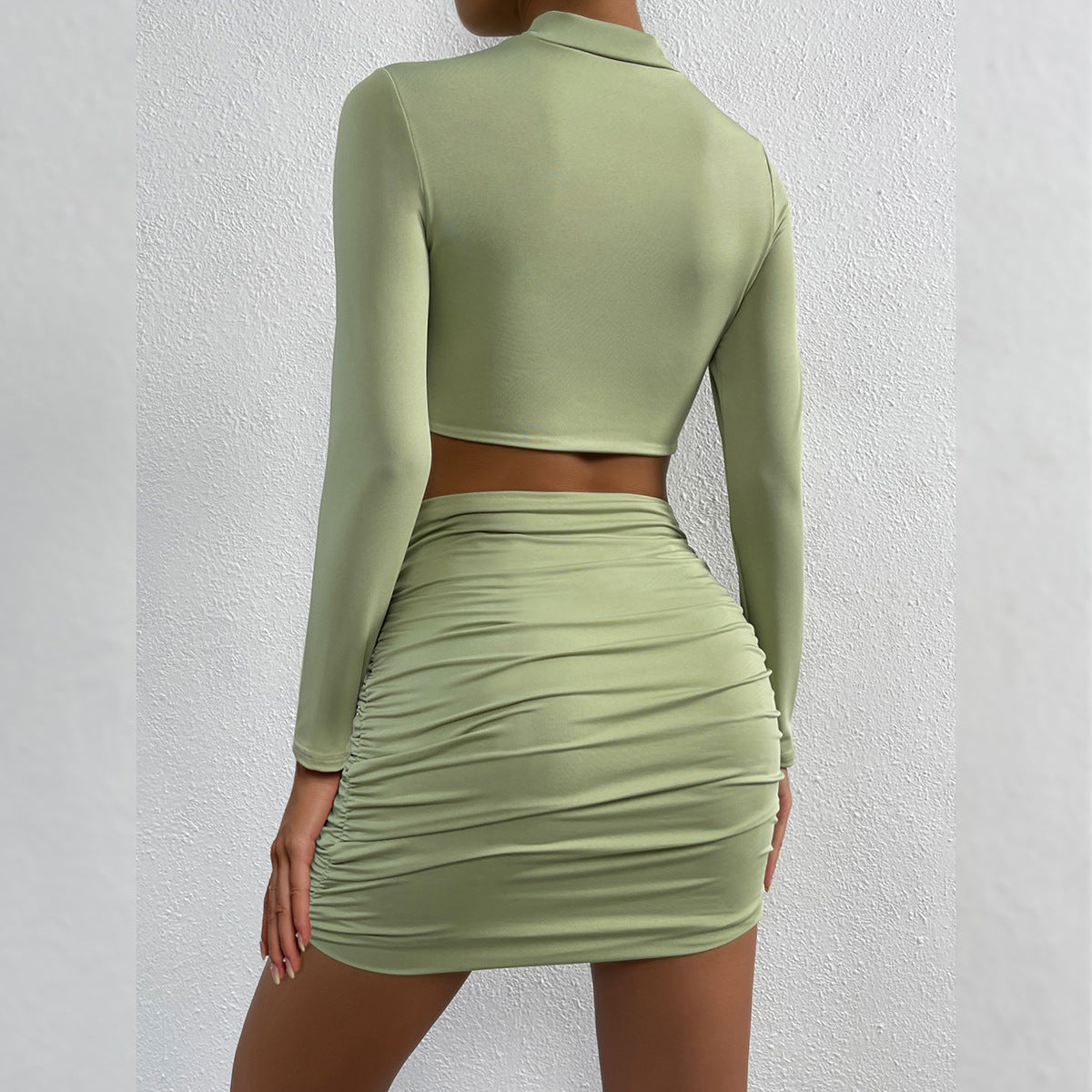 Women's Cutout Long Sleeve Pleated Cropped Navel Two-Pieces Tops Skirt Set