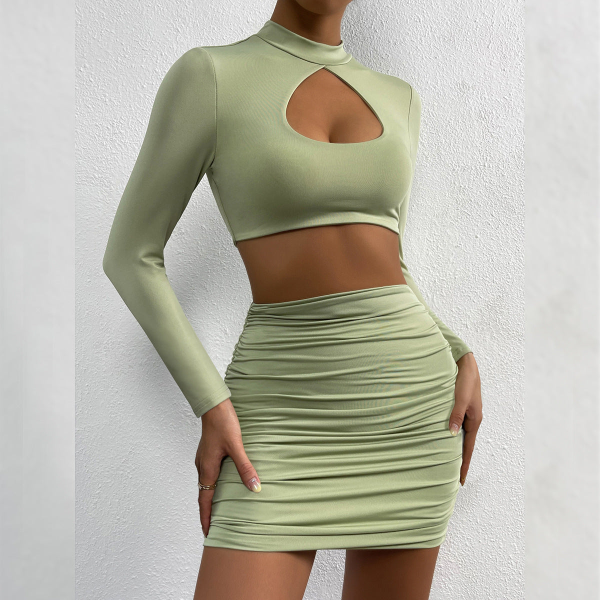 Women's Cutout Long Sleeve Pleated Cropped Navel Two-Pieces Tops Skirt Set