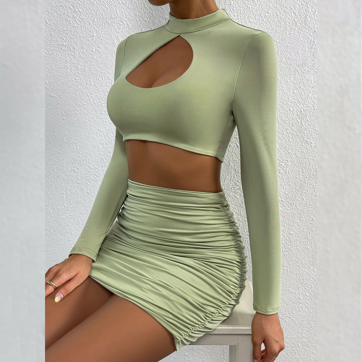 Women's Cutout Long Sleeve Pleated Cropped Navel Two-Pieces Tops Skirt Set