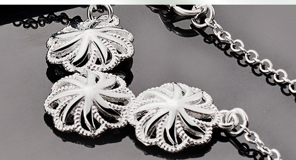 45cm Women Fashion Silver Flower-shaped Hollow Pendant Necklace