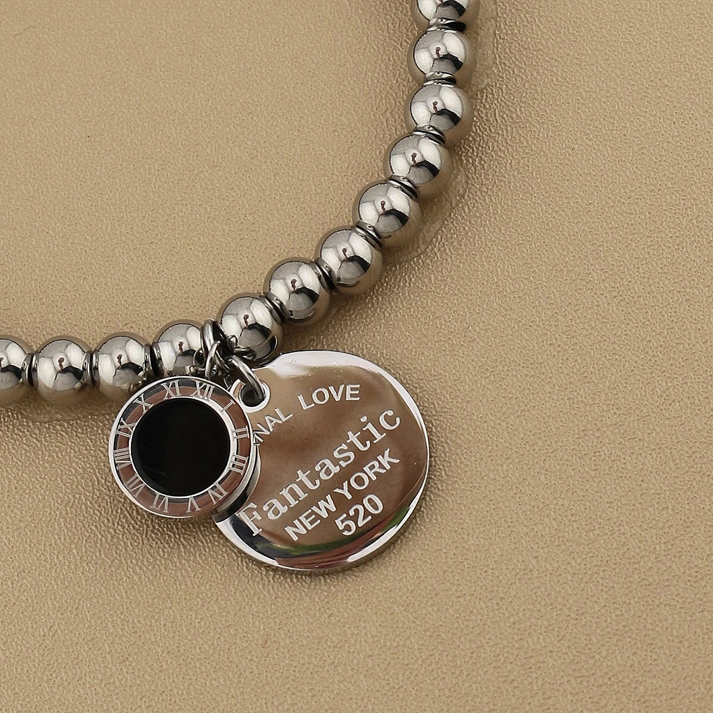 Women Fashion Cutout Medallion Pendant Elastic Rope Stainless Steel Bead Chain Bracelet