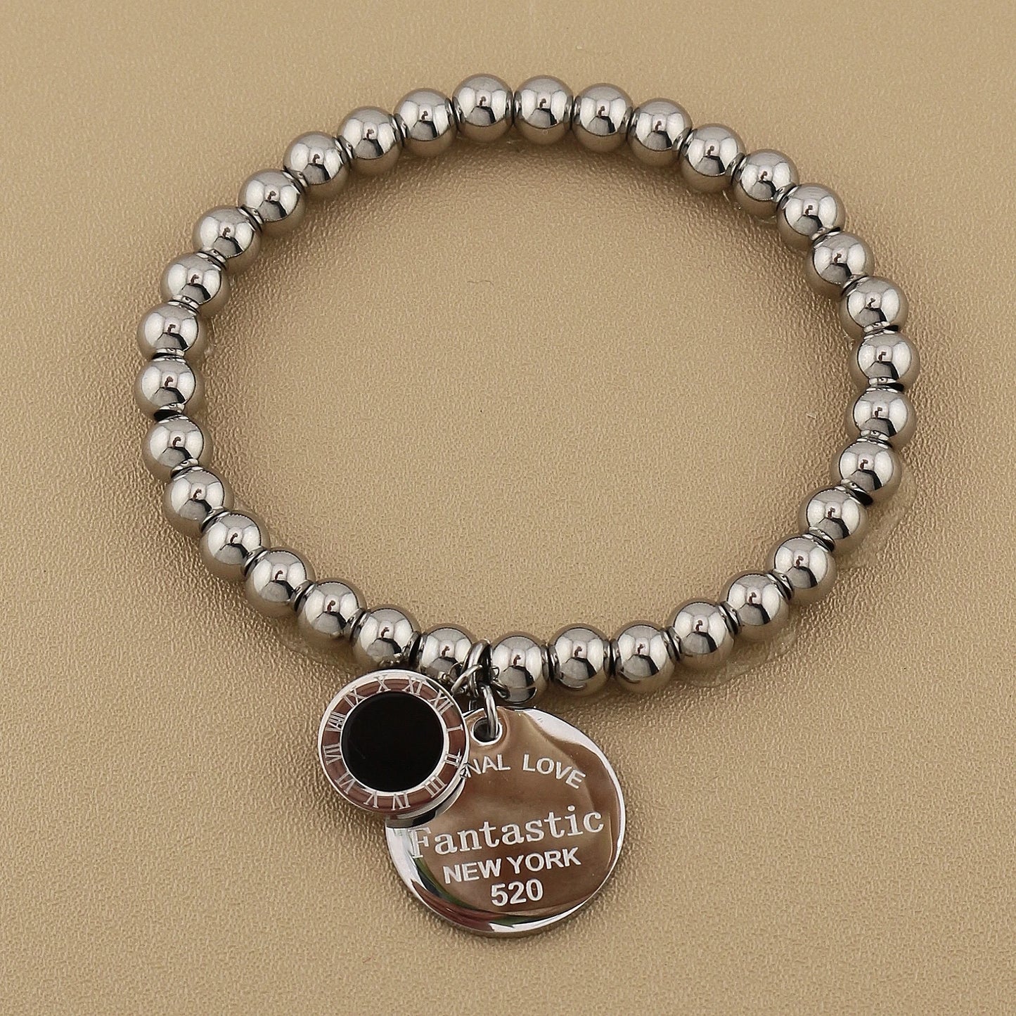 Women Fashion Cutout Medallion Pendant Elastic Rope Stainless Steel Bead Chain Bracelet