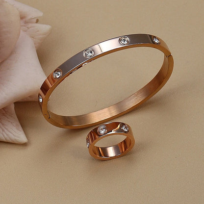 2-in-1 Women 18K Gold-Plated Stainless Steel Bracelet Ring Jewelry Set.
