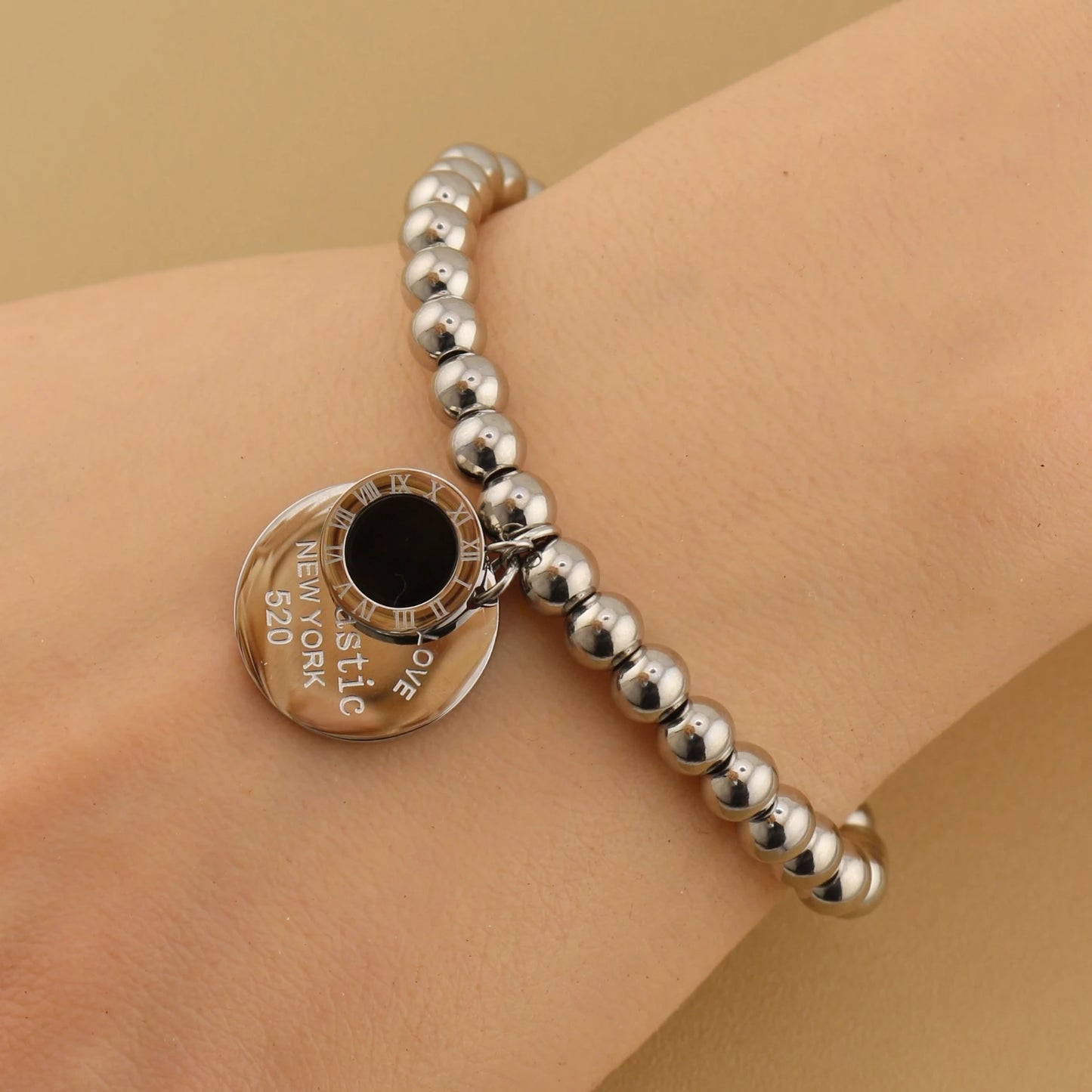 Women Fashion Cutout Medallion Pendant Elastic Rope Stainless Steel Bead Chain Bracelet