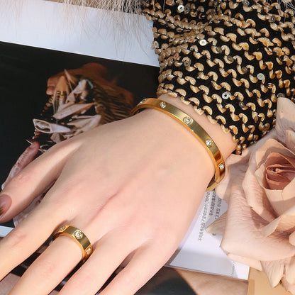 2-in-1 Women 18K Gold-Plated Stainless Steel Bracelet Ring Jewelry Set.