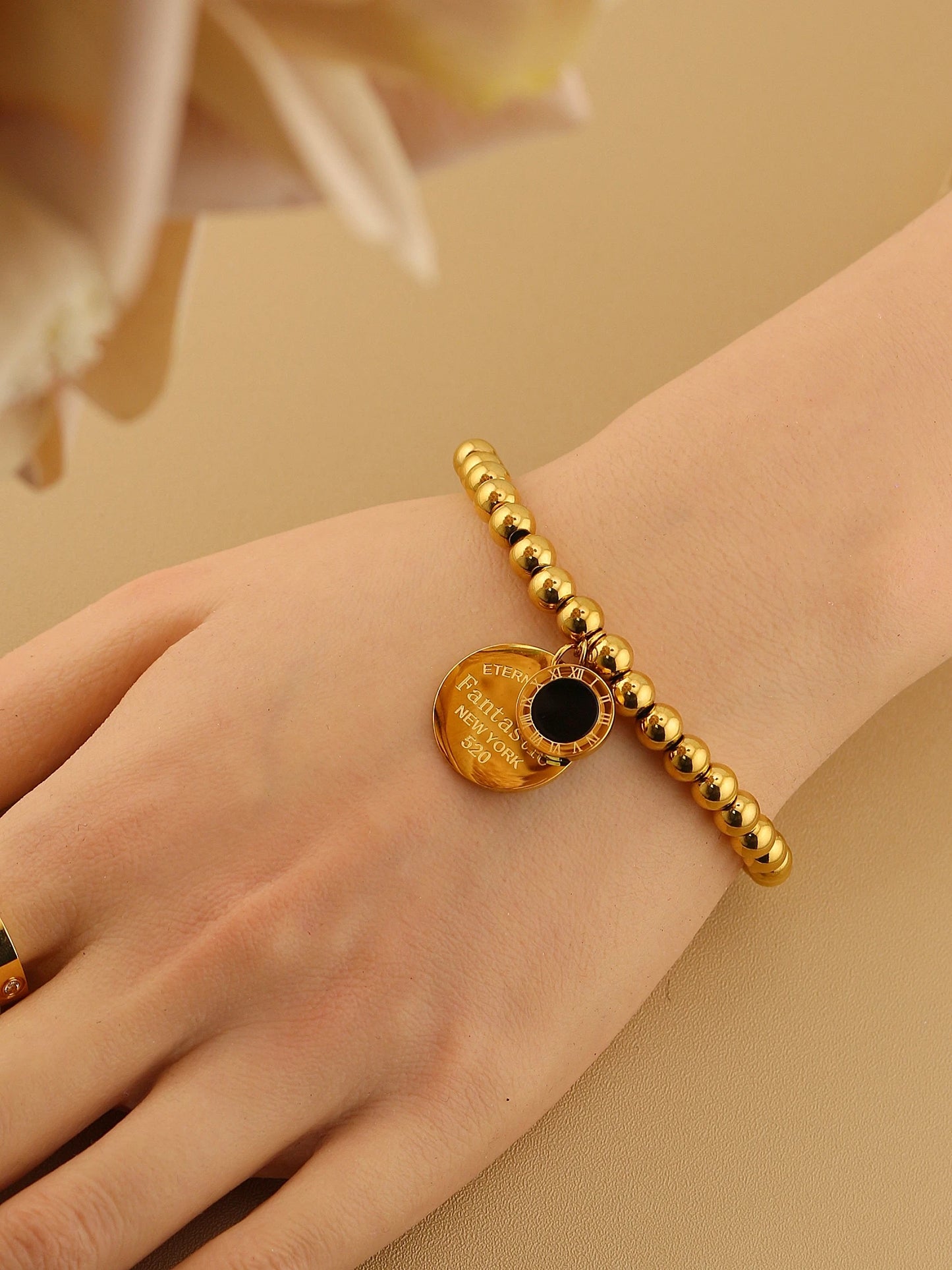 Women Fashion Cutout Medallion Pendant Elastic Rope Stainless Steel Bead Chain Bracelet