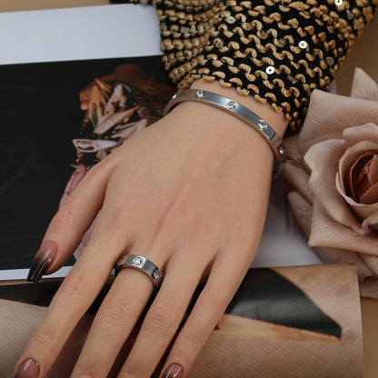 2-in-1 Women 18K Gold-Plated Stainless Steel Bracelet Ring Jewelry Set.