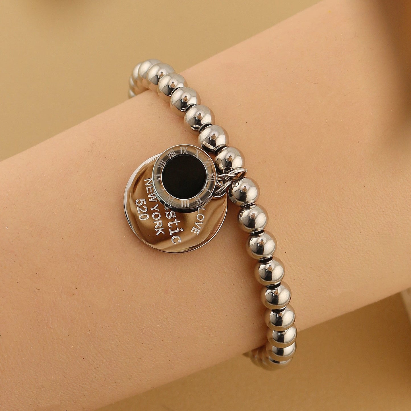 Women Fashion Cutout Medallion Pendant Elastic Rope Stainless Steel Bead Chain Bracelet