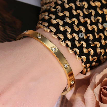 2-in-1 Women 18K Gold-Plated Stainless Steel Bracelet Ring Jewelry Set.