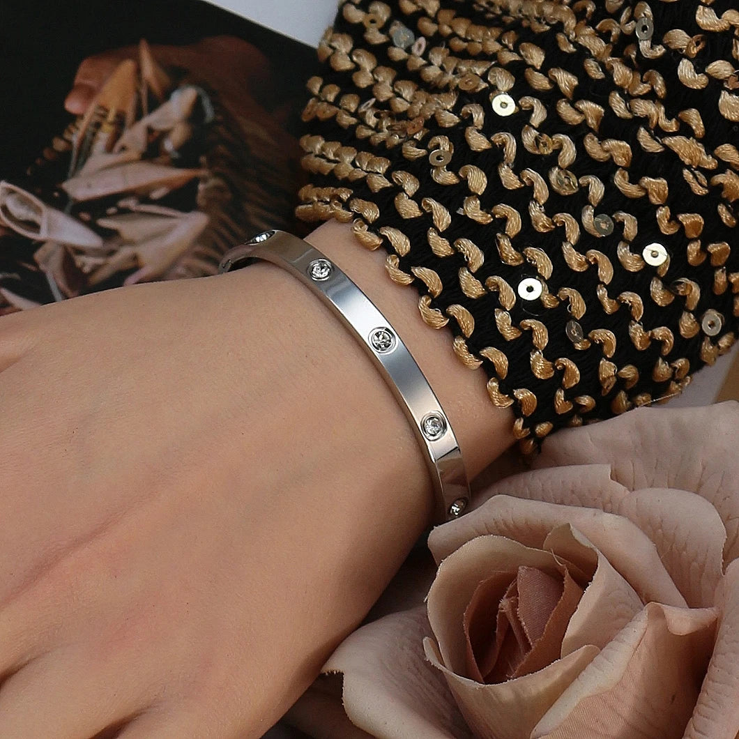 2-in-1 Women 18K Gold-Plated Stainless Steel Bracelet Ring Jewelry Set.