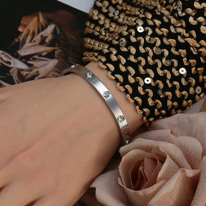 2-in-1 Women 18K Gold-Plated Stainless Steel Bracelet Ring Jewelry Set.