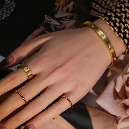 2-in-1 Women 18K Gold-Plated Stainless Steel Bracelet Ring Jewelry Set.