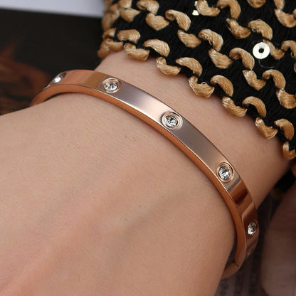 2-in-1 Women 18K Gold-Plated Stainless Steel Bracelet Ring Jewelry Set.